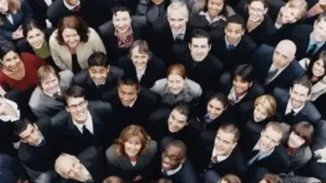 Large Group of Business People Standing and Looking up at Camera